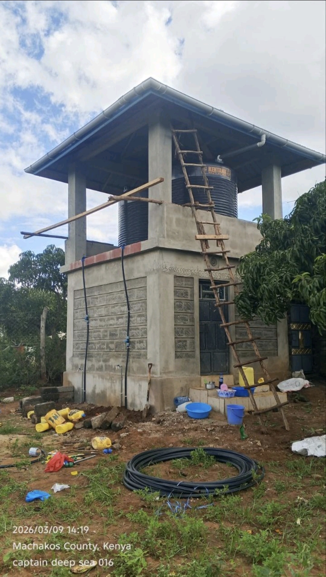 Concrete elevated tank structure with two 10,000 litre tanks and a store beneath, Kitui Central
